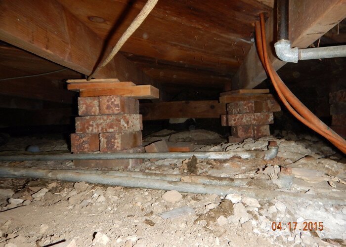 improper install of piers in crawlspace at fort worth Office