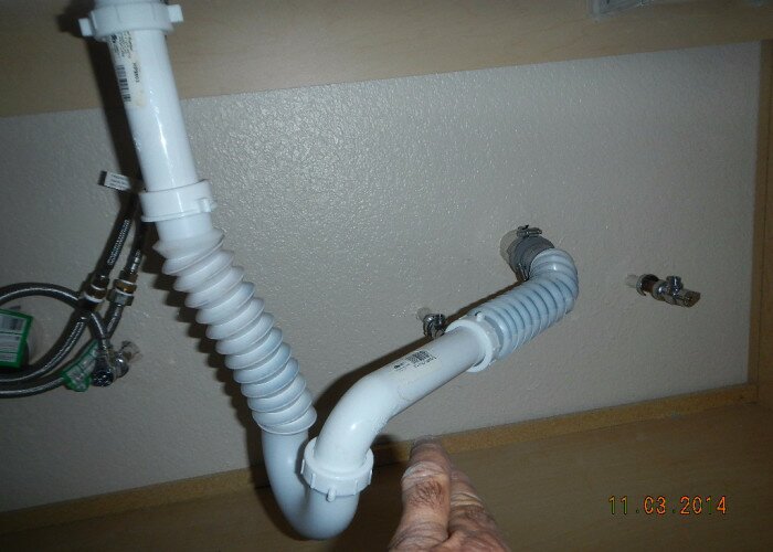 improper drain install under sink at fort worth Office